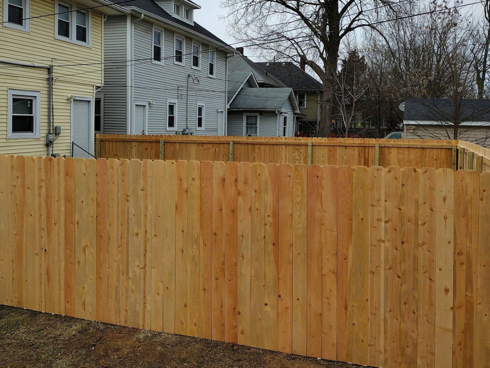 Photo of a wood fence installed in winter in Indianapolis, Indiana by Good Shepherd Fence Company
