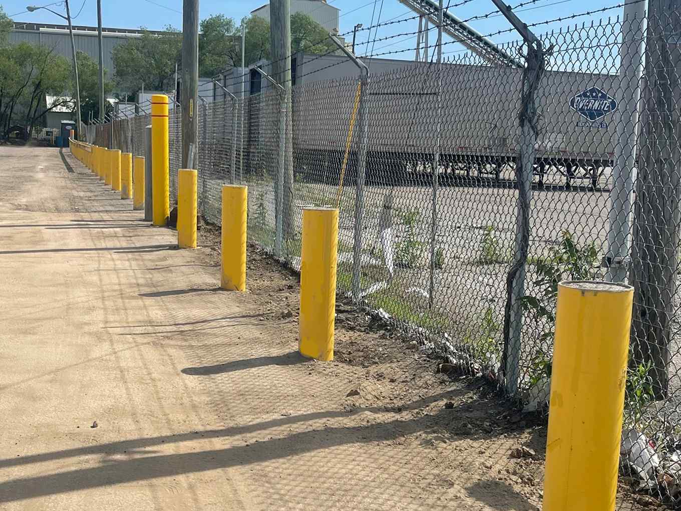 Commercial fence company in Indianapolis, Indiana bollards example